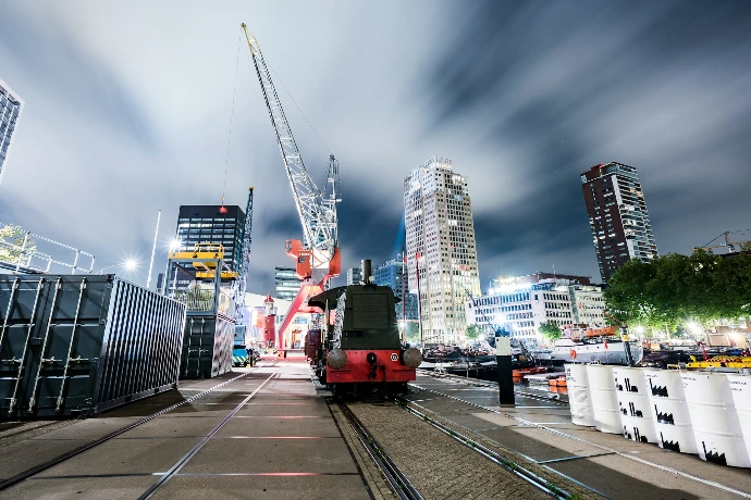 red and black train on rail road during daytime